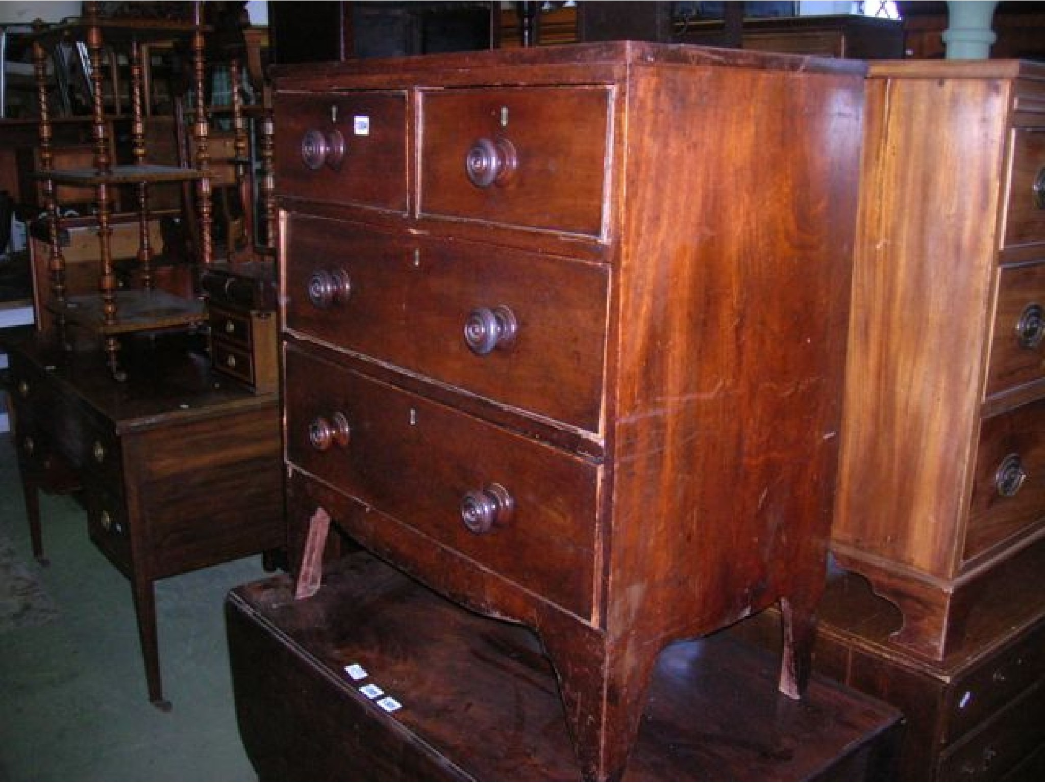 A small 19th century mahogany bedroom chest of two long