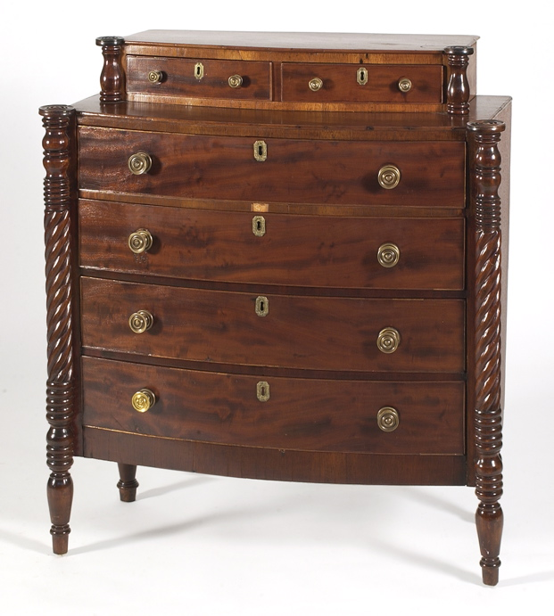 ANTIQUE AMERICAN SHERATON BOWFRONT STEPDOWN BUREAU Late 19th CenturyIn mahogany