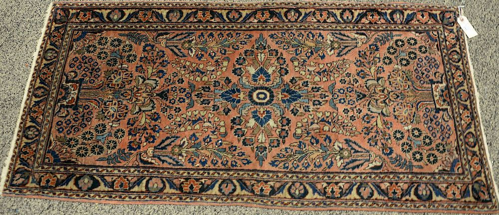 Three Oriental rugs to include an Oriental runner and Sarouk