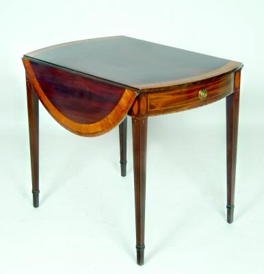 A VICTORIAN MAHOGANY PEMBROKE TABLE of Georgian design with stringing
