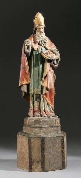 A Northern European polychrome and giltwood figure of St Nicholas