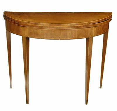 A George III mahogany demi lune card table inlaid stringing