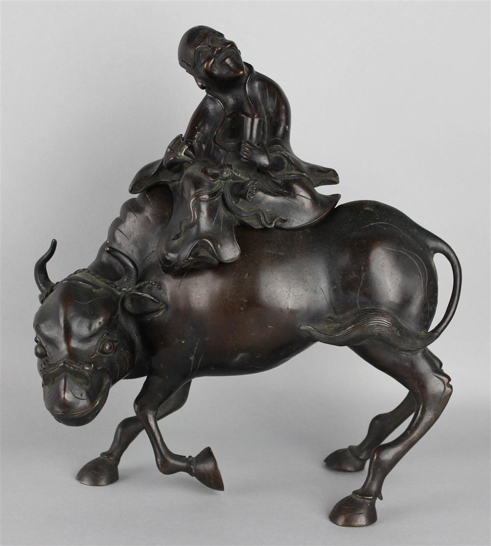 JAPANESE BRONZE MODEL OF IMMORTAL ON BACK OF OX SEALED