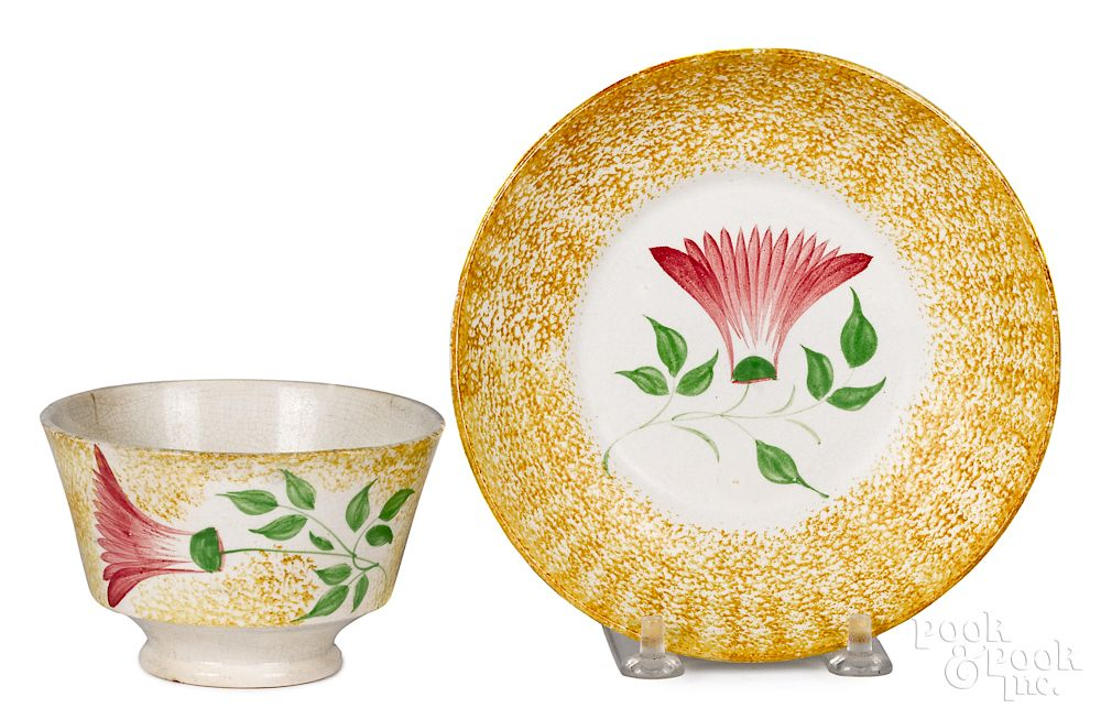 Yellow spatter thistle cup and saucer Yellow spatter thistle cup