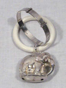 A mixed lot comprising a silver baby bracelet and a