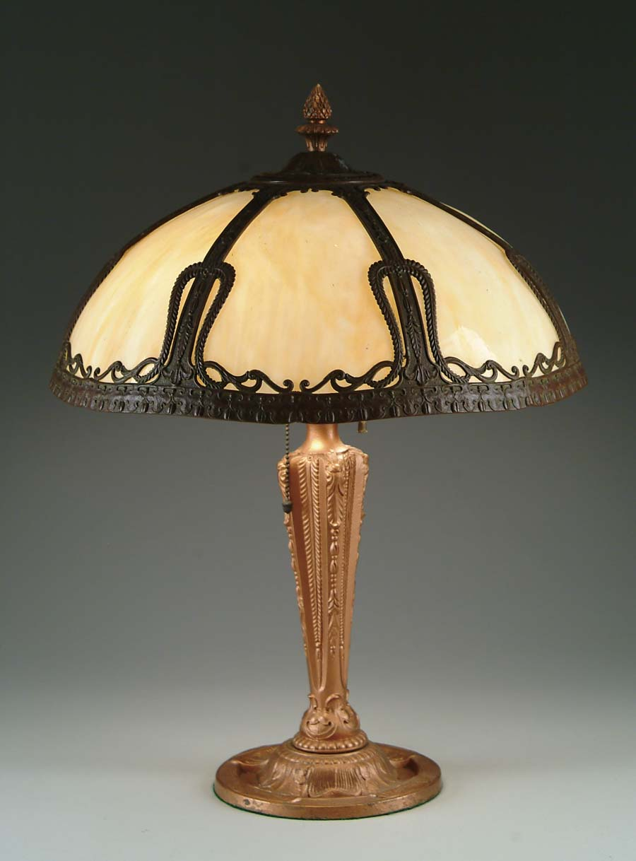 BENT PANEL LAMP Dome shaped shade has seven bent carmel