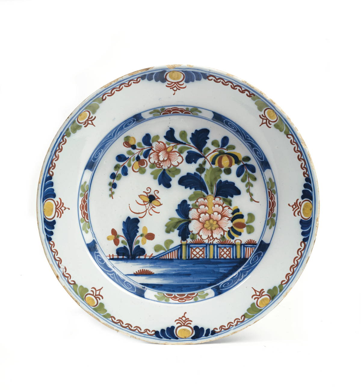 LONDON DELFT POLYCHROME DISH DEPICTING A FENCE GARDEN AND FLYING