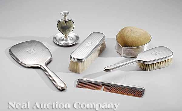A Four Piece Gorham Sterling Silver Mounted Dresser Set early
