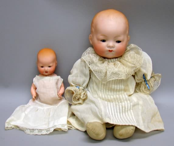 Pair of solid dome baby dolls 8 1 2 T