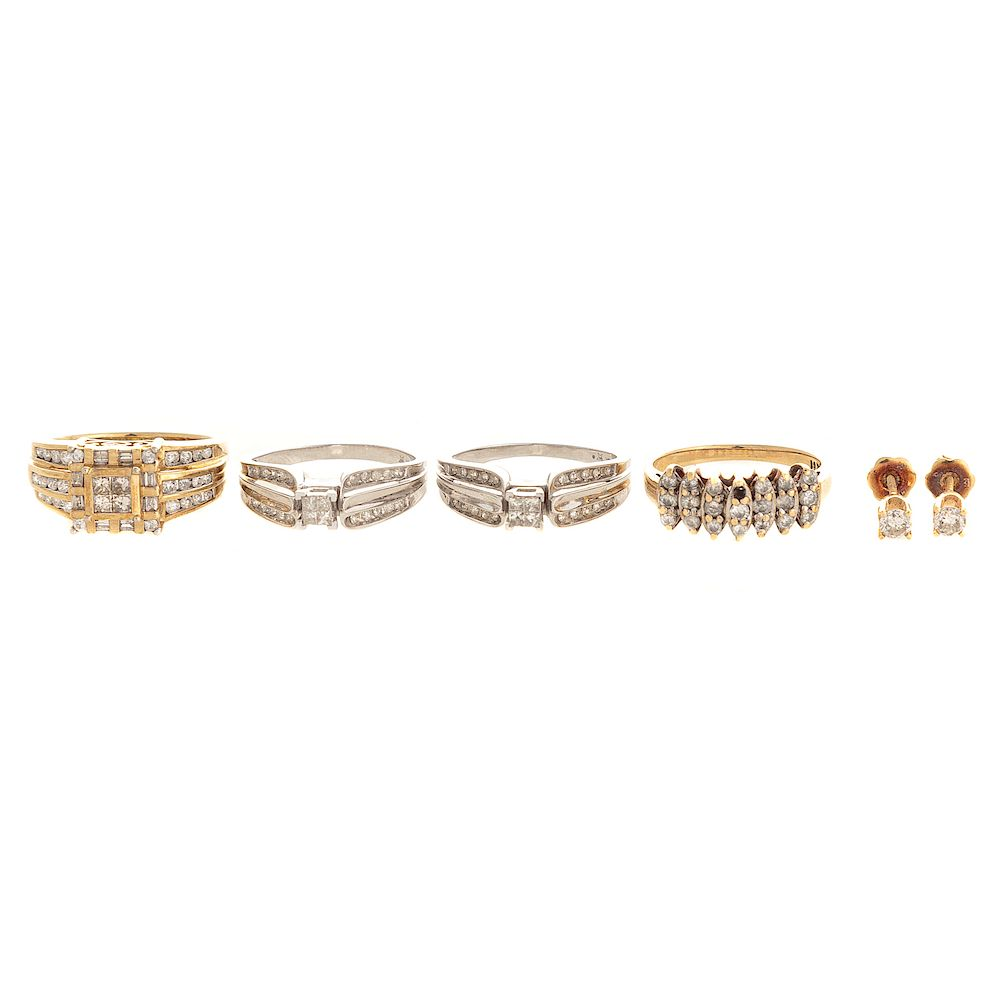 An Assortment of Diamond Rings earrings 1 10K yellow gold