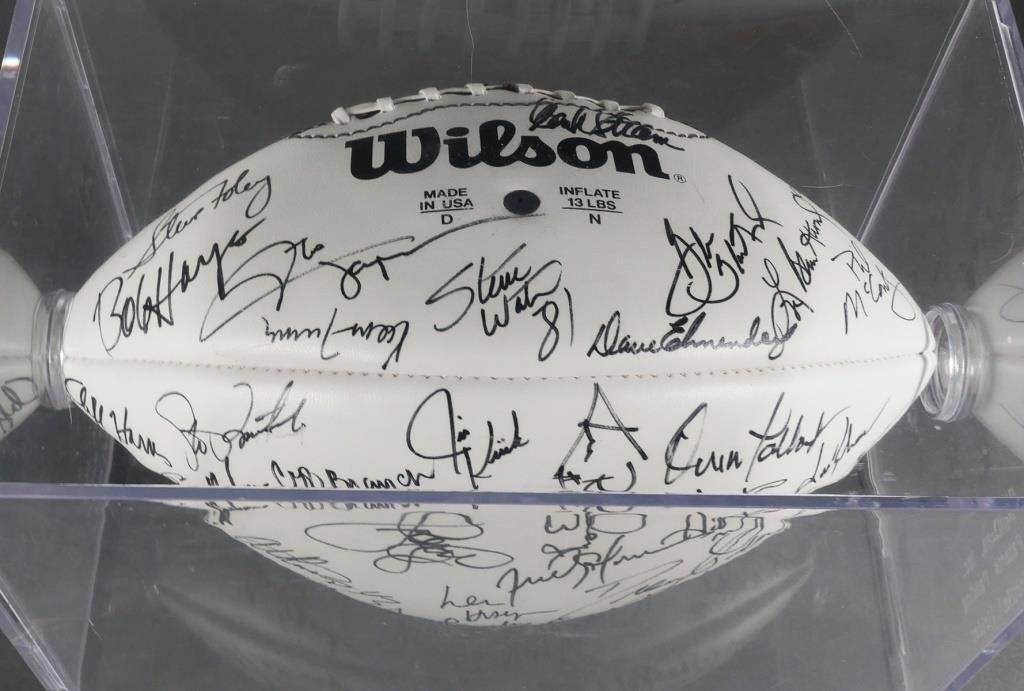 Football signed by players from the 1960s or so including