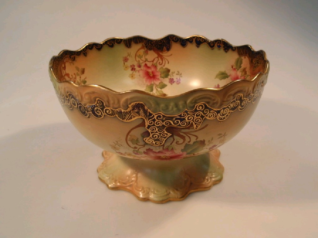 A Carlton ware fruit bowl printed and painted with floral