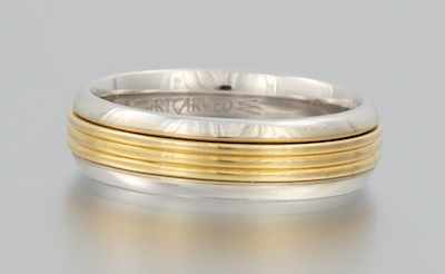 A Two Tone Gold Band 14k white gold band with