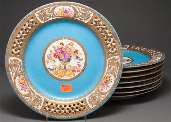 Eight Sevres style floral transfer parcel gilt porcelain bleu celeste