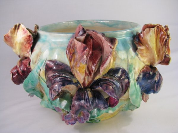 French Majolica jardiniere with floral iris relief in purple yellow