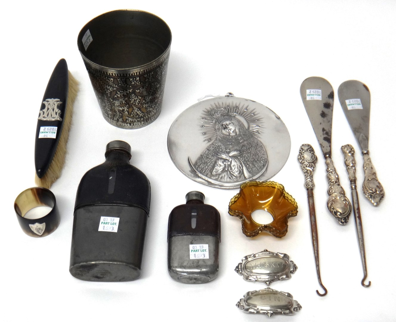 Two spirit flasks with pull off beaker bases a large