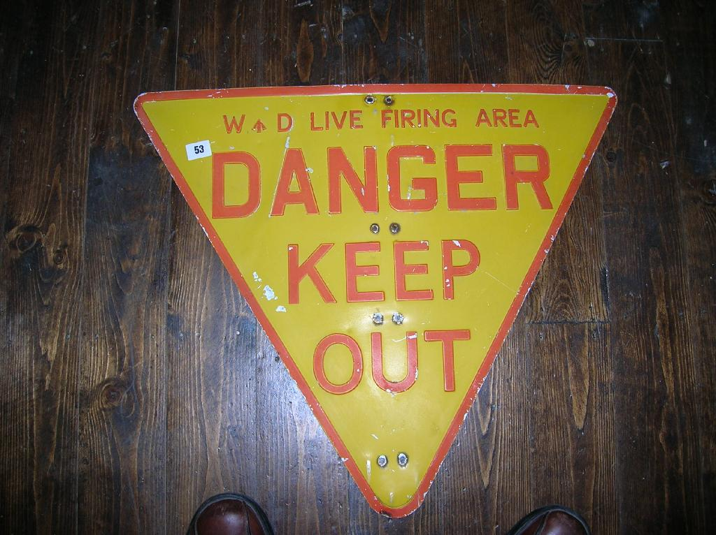 A War Department live firing area danger sign a photographic