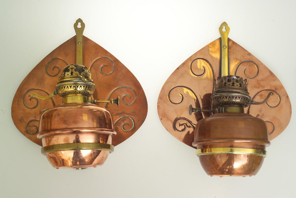 PAIR OF CONTINENTAL COPPER AND BRASS WALL LIGHTS c 1900