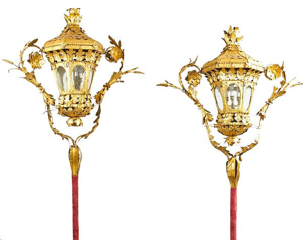 A pair of important Venetian Rococo parcel gilt iron t