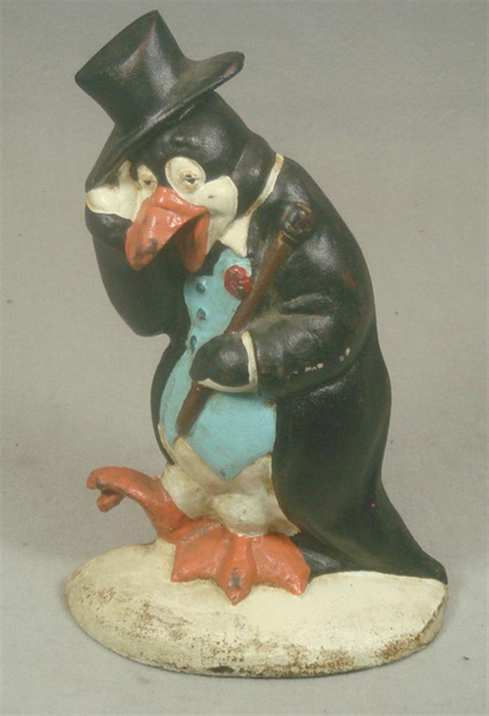 Cast iron doorstop colorful penguin in tuxedo with cane and