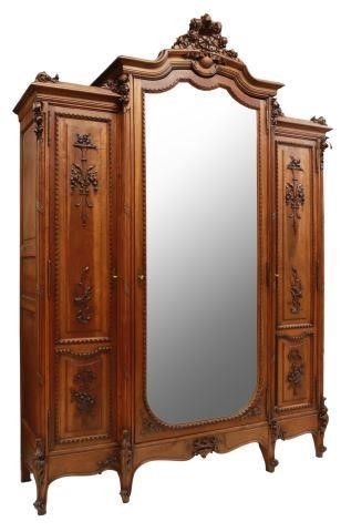 French Louis XV style walnut triple armoire early 20th c