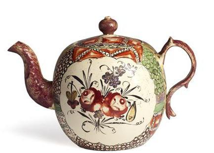 WEDGWOOD CREAMWARE ENAMEL DECORATED CHINTZ TEAPOT AND COVER POSSIBLY PAINTED