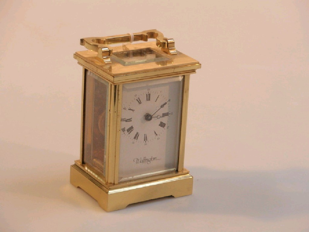 A 20thC gilt metal Wellington carriage clock by Fema London