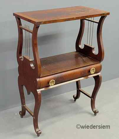 Philadelphia Classical mahogany lyre form table with a single drawer