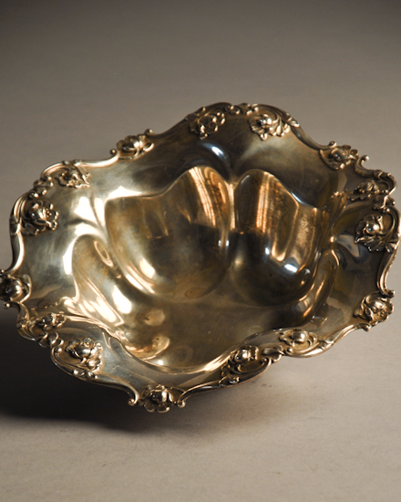 A Reed Barton Sterling Bowl having a deeply lobed body