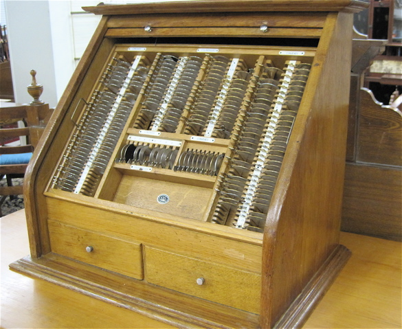 A FRENCH OPTICIAN S EYE GLASS PRESCRIPTION CASE in golden