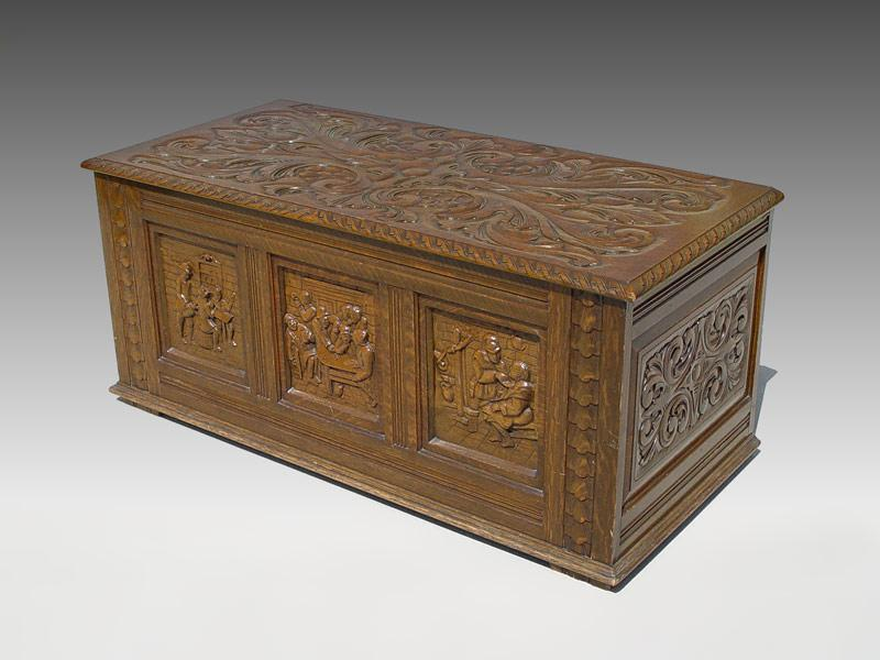 CARVED OAK BLANKET CHEST German tavern scenes in recessed panels
