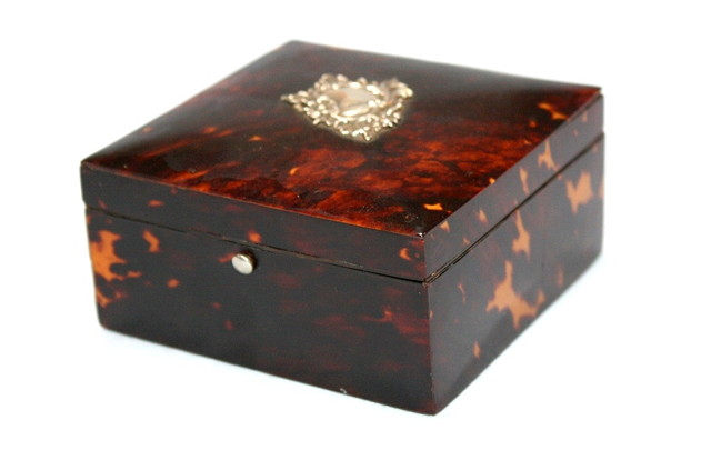 A VICTORIAN TORTOISESHELL CIGARETTE BOX plain with domed hinged lid
