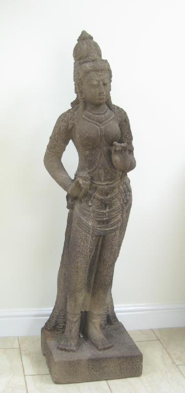 An Indonesian volcanic Standing Goddess Dewi Tara with ringlet hair