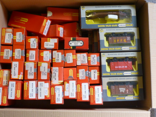 Thirty four Triang Hornby goods trucks including Shell tank wagons
