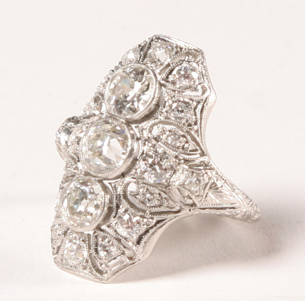 Antique platinum ring bezel set with 3 European cut diamonds