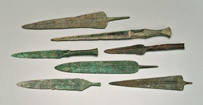 Seven ancient bronze daggers or spear points probably Luristan probably
