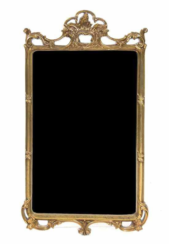 A Contemporary Giltwood Mirror having an open Rococo crest over