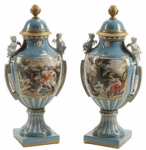 pair French Sevres style covered porcelain urns lids having pineapple