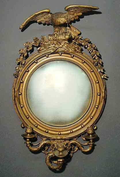 Federal style gilt decorated girandole mirror with an eagle finial