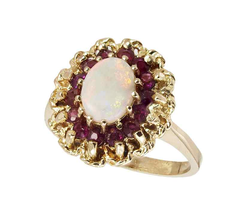DIAMOND AND RUBY RING 14K yellow gold ring centers one