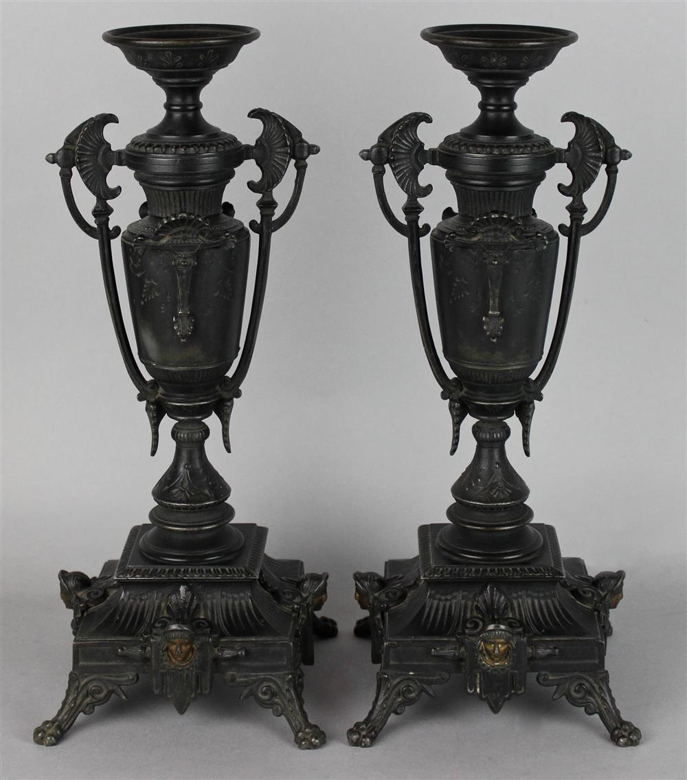 PAIR OF EASTLAKE STYLE PATINATED METAL URNS cast marks to