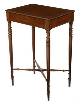 An early 19th century mahogany side table with a reeded