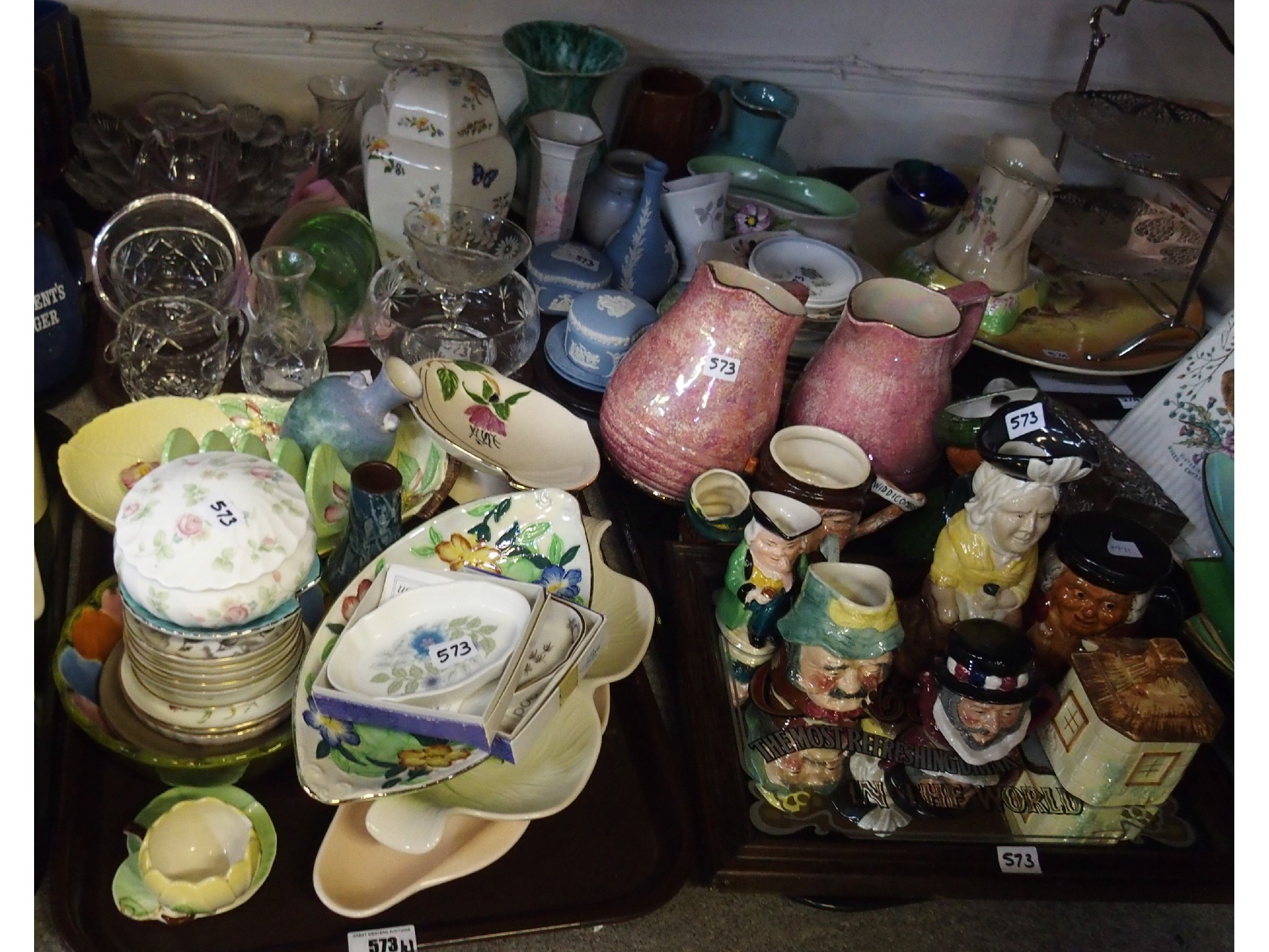 Four trays comprising various ceramics and glasswares including toby jugs