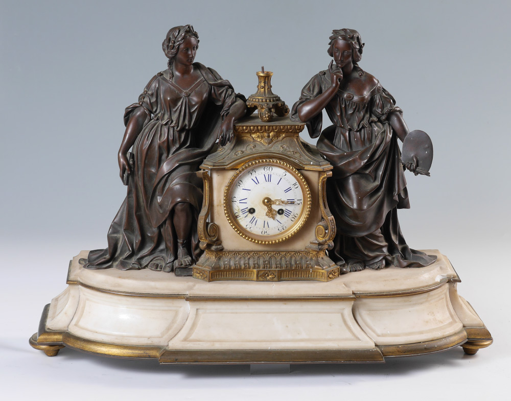 A PROJECT BRONZE MARBLE FIGURAL MANTLE CLOCK A nice clock