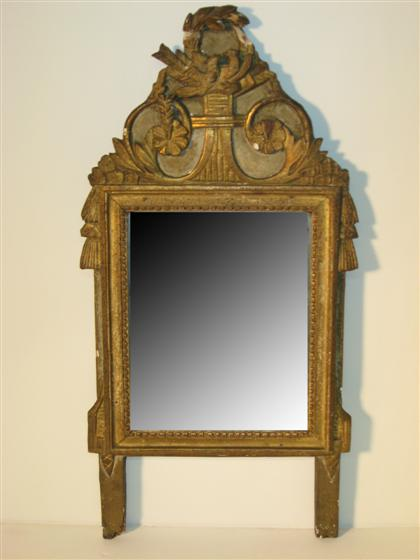 French neoclassical style parcel gilt wall mirror 18th century With