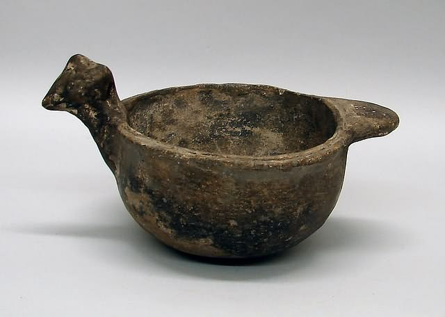 Bird form prehistoric 4 tall bowl opening measures 6 x