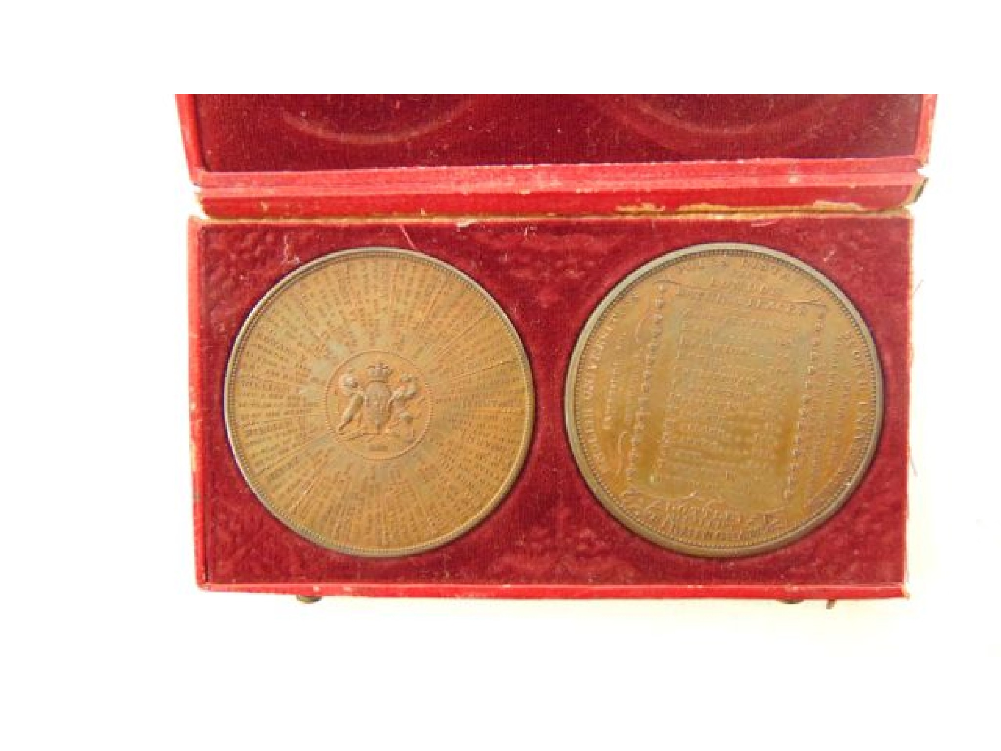 Two cased bronze medallions Chronology of the reigns of England