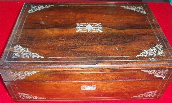 A Victorian rosewood workbox the hinged lid inlaid a central