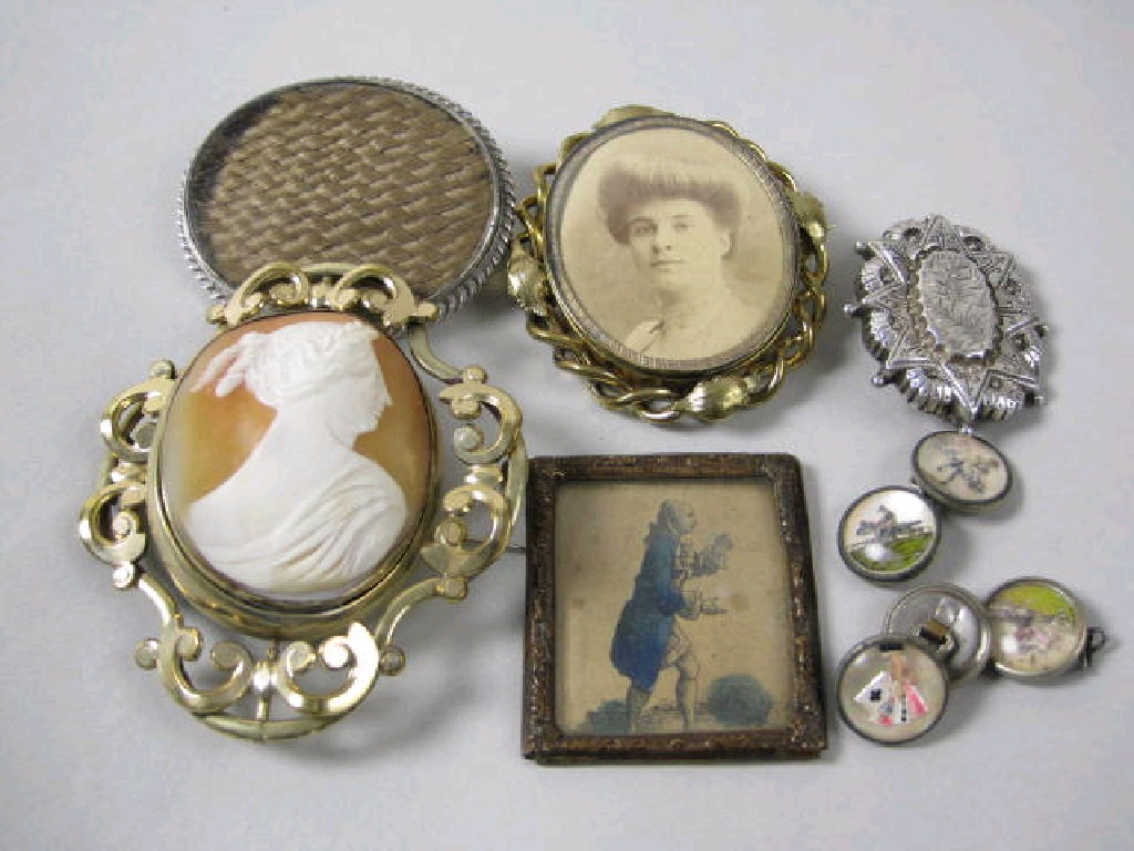 A woven hair Brooch a carved Shell Cameo Brooch in