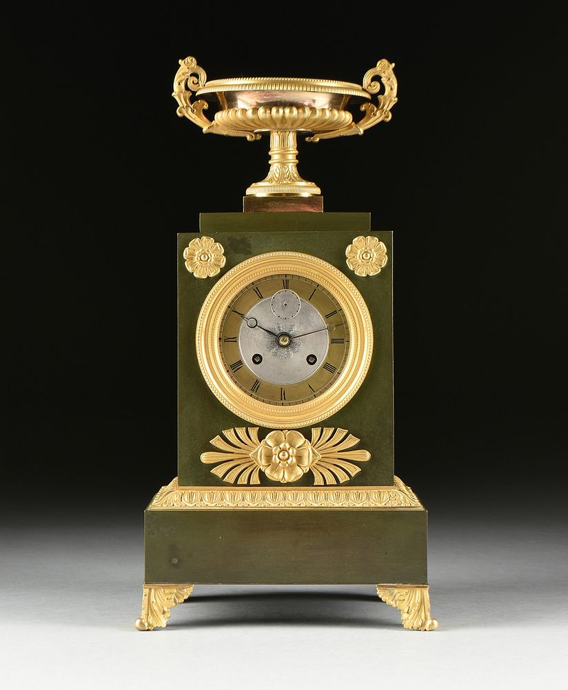 A RESTAURATION GILT AND GREEN PATINATED BRONZE MANTLE CLOCK 1820s